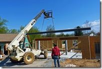 Placing the steel beam for the garage